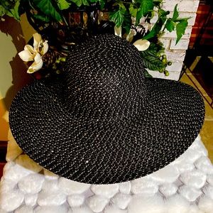 Something Special black floppy hat.